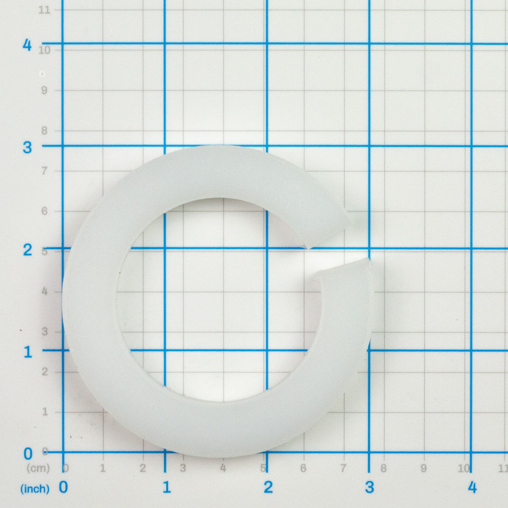 Spacer (Plastic, 5/8"), Labrie part 51540, shown on a measuring grid