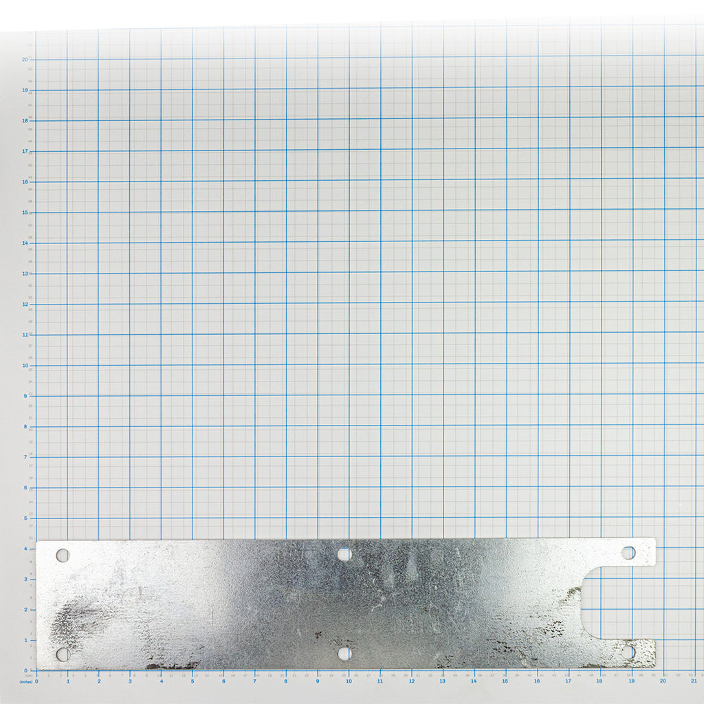 Shim (14 Ga., .079"), Labrie part 84913, shown on a measuring grid