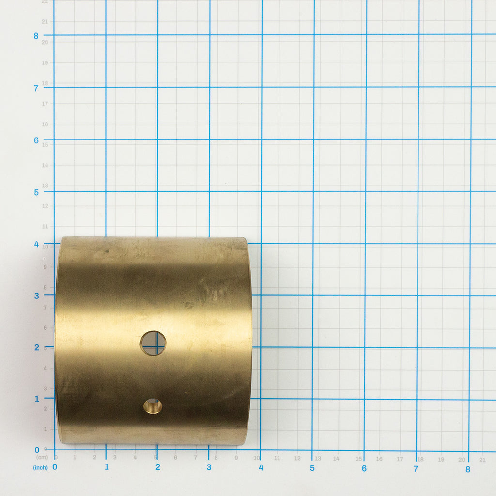 Bushing, Labrie part 120040, shown on a measuring grid