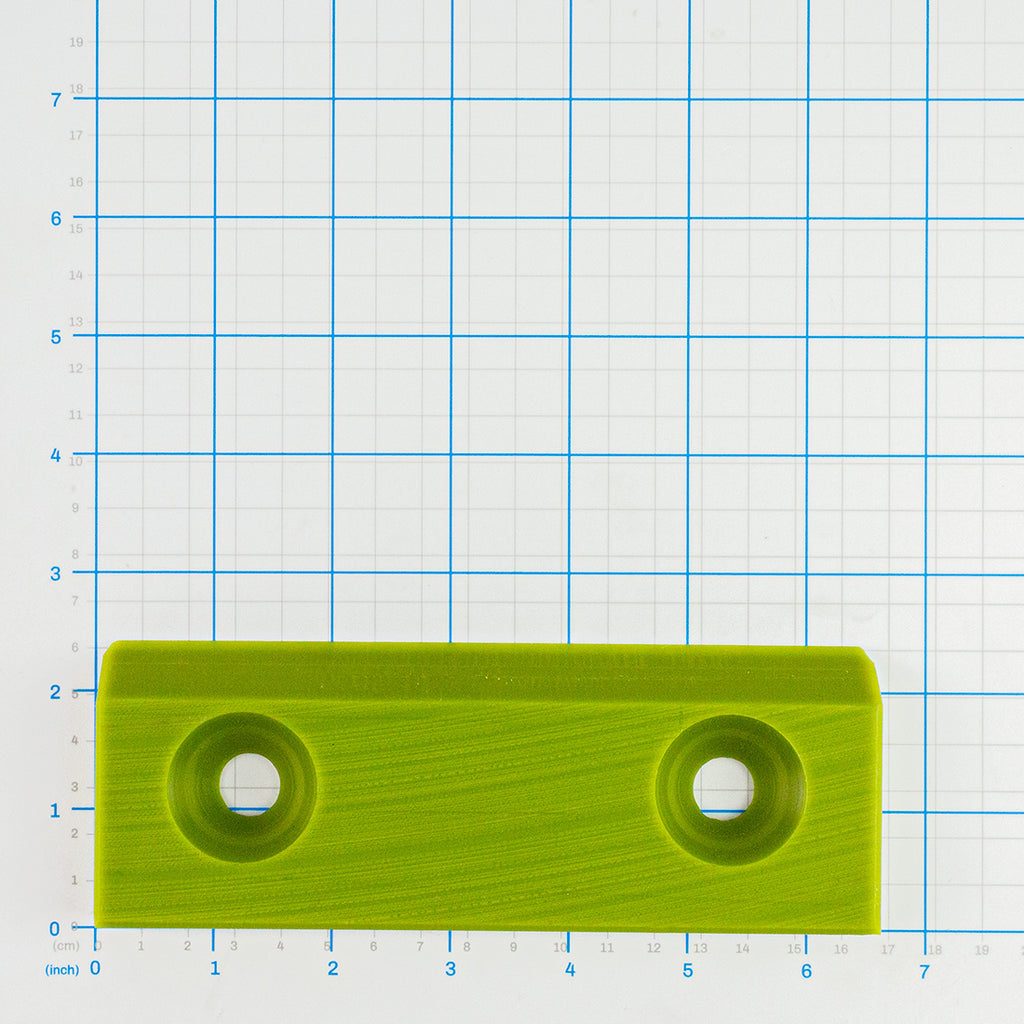 Plastic Guide, Labrie part 73233, shown on a measuring grid