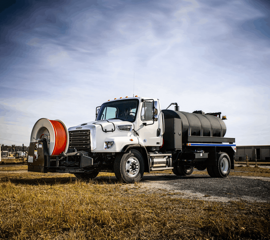 Vac-Con Hot Shot jetter truck with front hose reel, front three-quarter view
