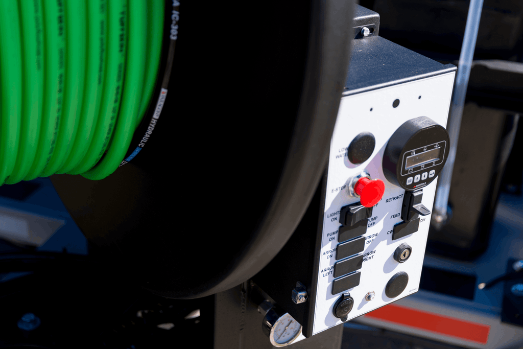 Vac-Con jetter trailer reel control panel with emergency stop and display
