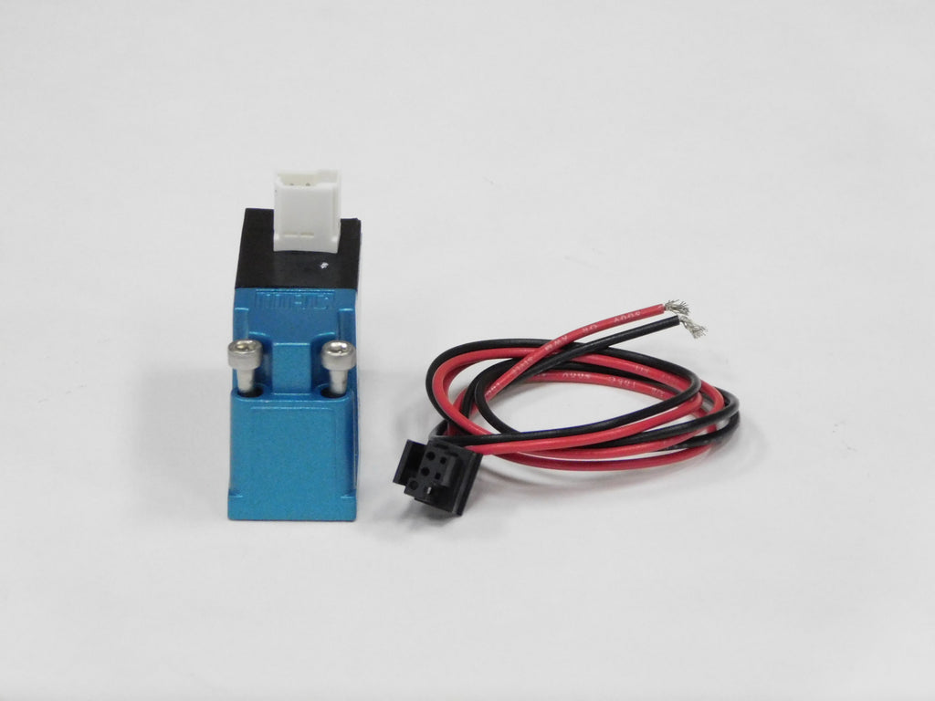 Solenoid Air Valve (3/2-Way, 12V), Labrie part PNV01965-01, shown on a measuring grid